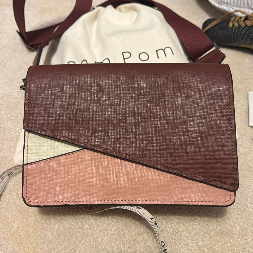 BOTKIER New York pocketbook. Like New. Leather pocketbook with adjustable strap.